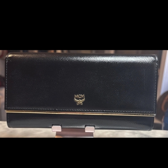 MCM Handbags - MCM Black Textured Wallet with Gold Accent